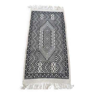 Handwoven black and white rug