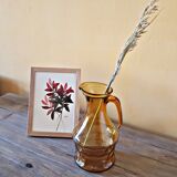 Amber glass pitcher decorated