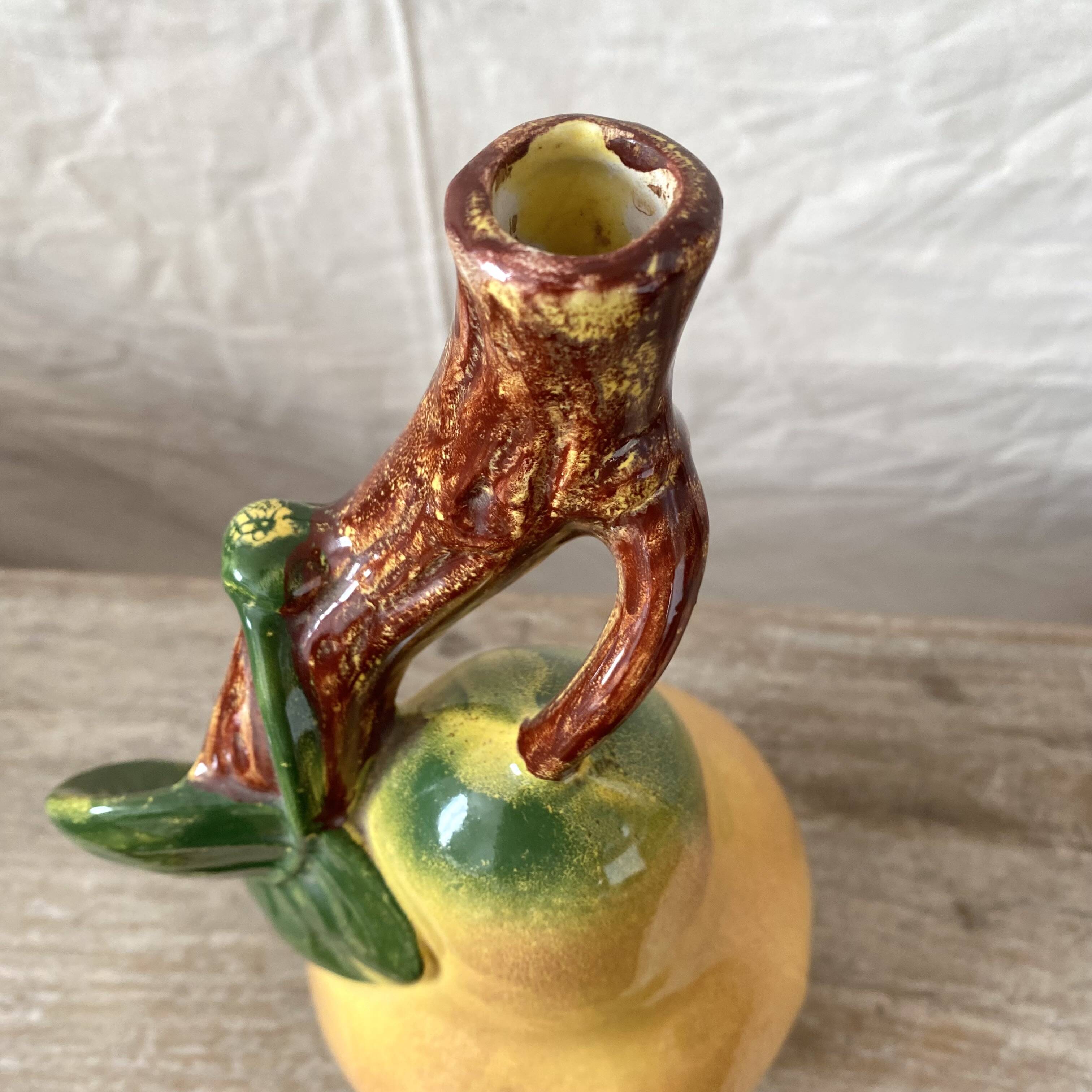 Vintage ceramic bottle in the shape of a pear.