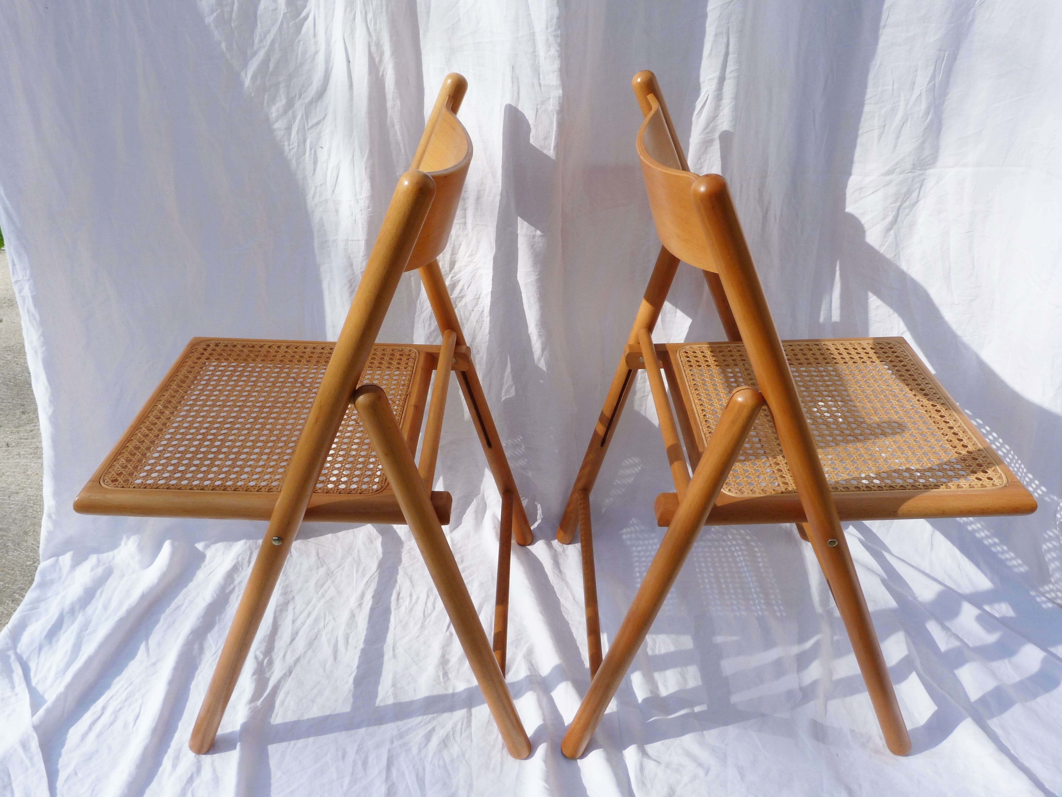 Duo of canned folding chairs