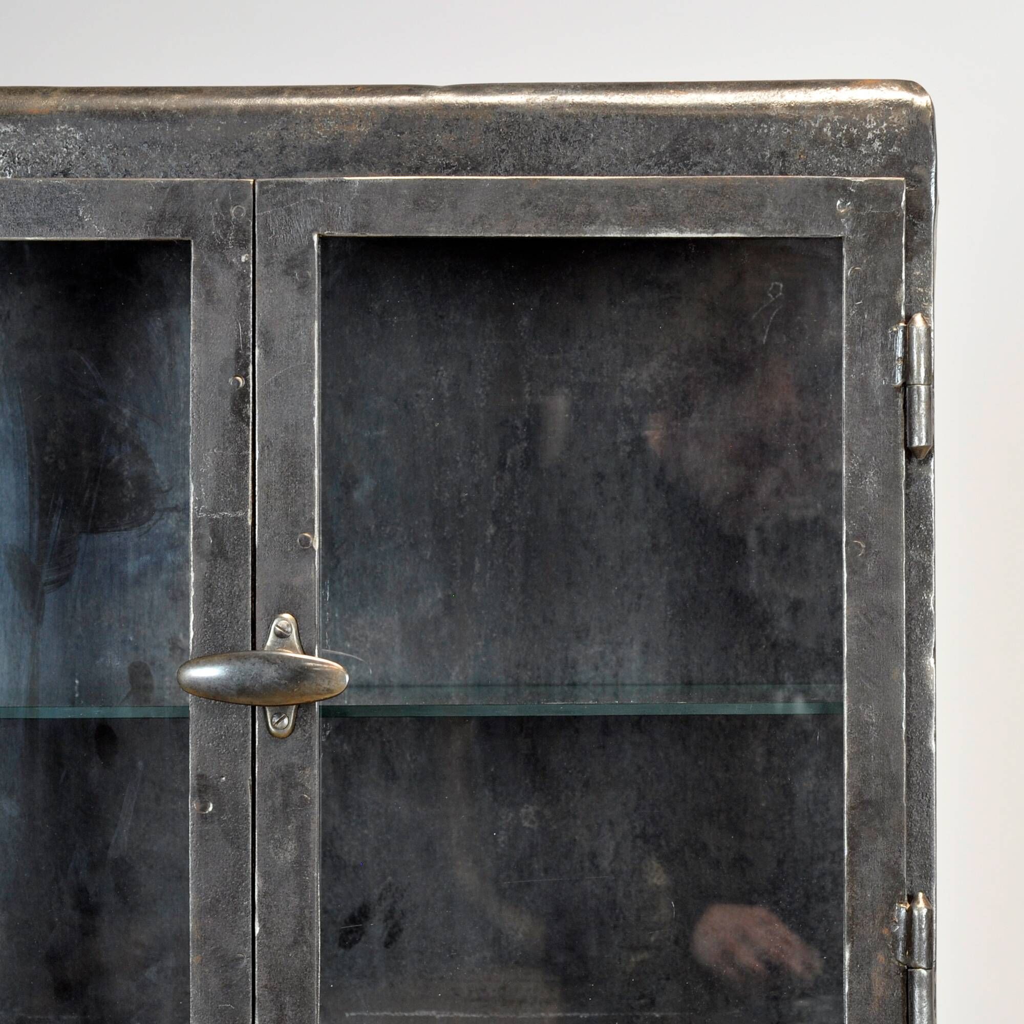 Antique industrial metal display cabinet, circa 1920