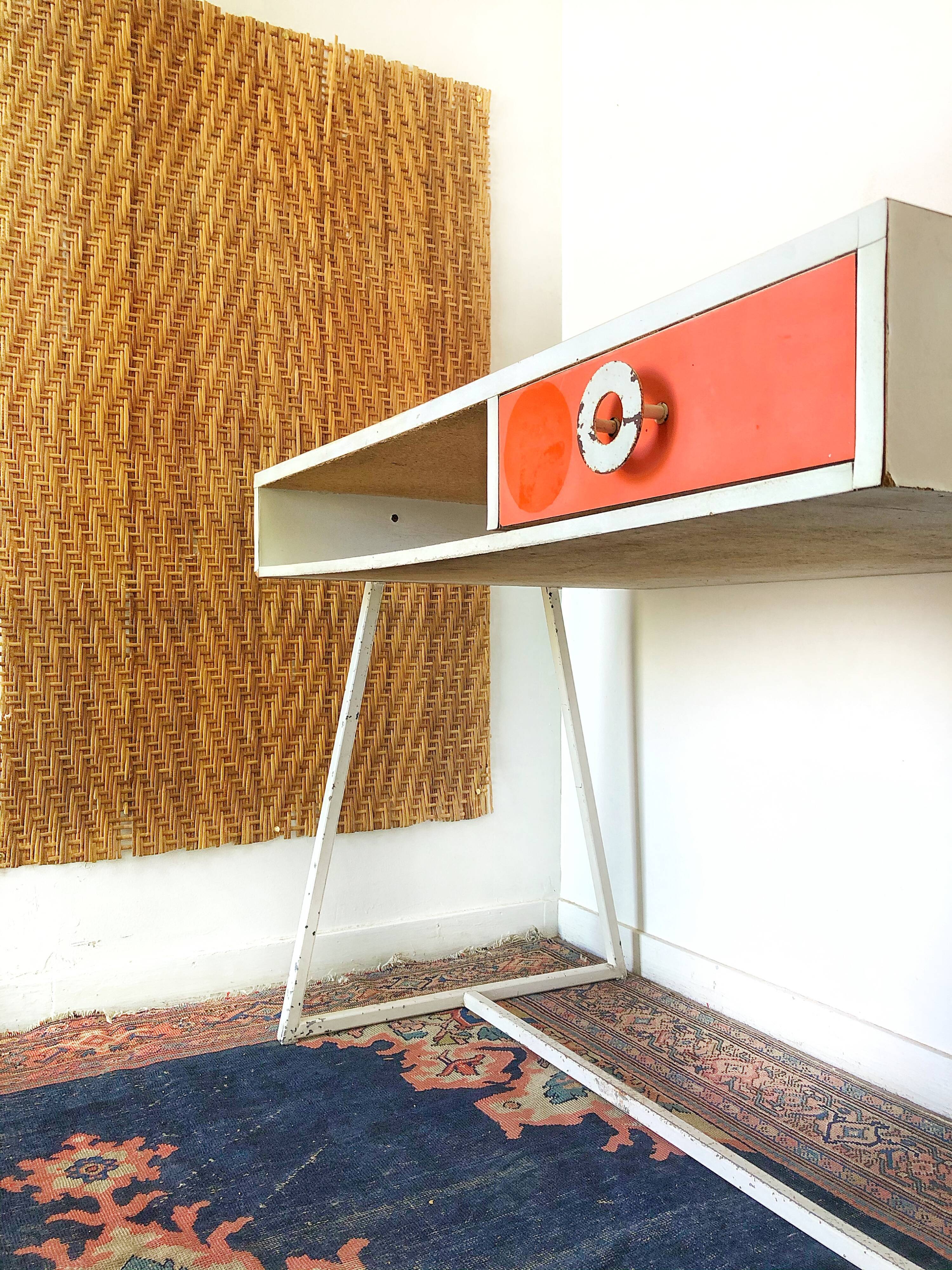Vintage desk and chair in orange formica