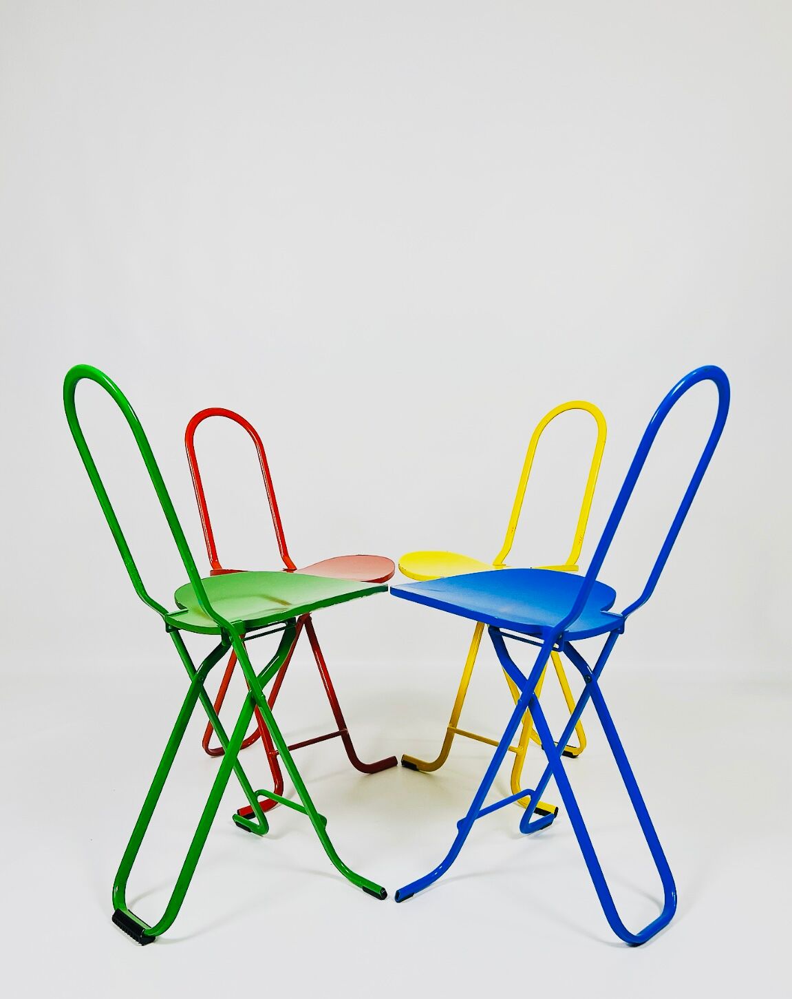 Dafne folding chair (colorful set) designed by Gastone Rinaldi
