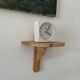 Small wall-mounted wooden shelf