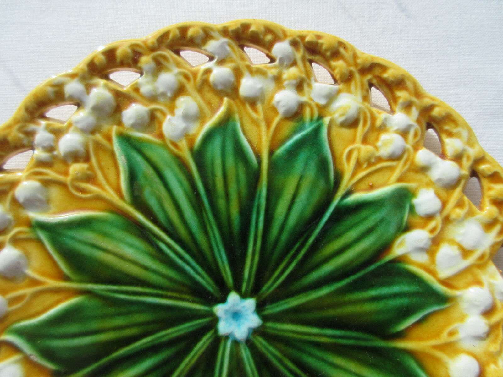 Art Nouveau open dabbling plate, Schramberg: Muguet yellow background