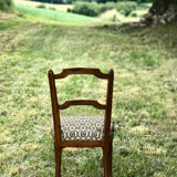 Antique chair seat upholsterer medallions
