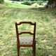 Antique chair seat upholsterer medallions