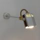 Pair of spot wall lamps adjustable design in white metal and brass. Year 80