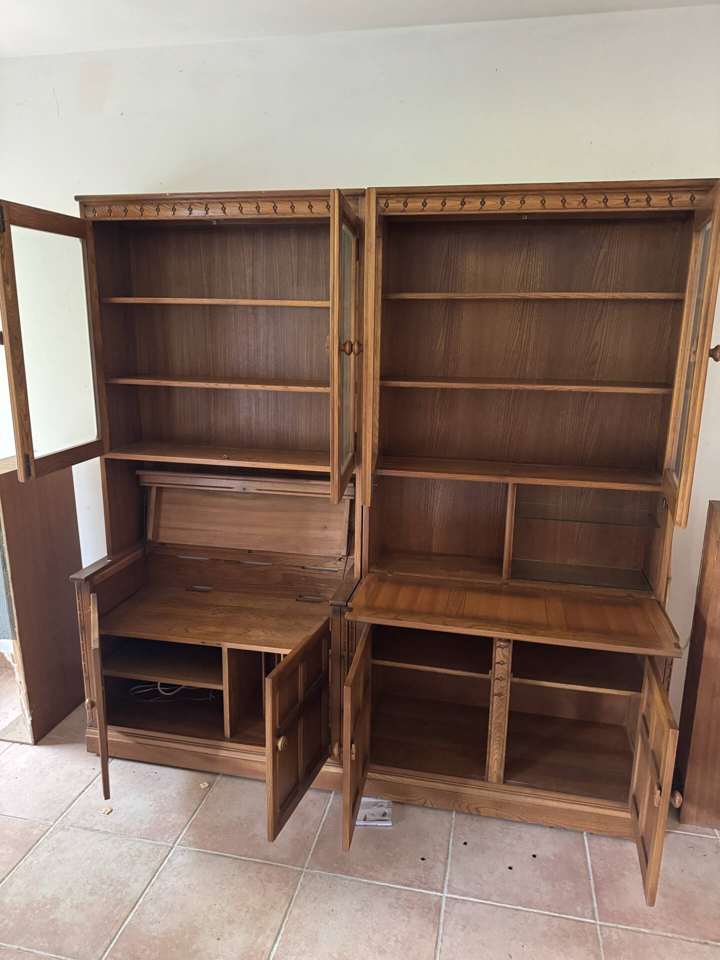 Ercol library cabinets storage England in elm
