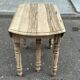 Round extendable dining table with flaps, stripped in raw oak, with 4 extensions.