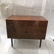 Lacquered 3-drawer chest with rosewood veneer.