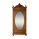 Antique solid wood wardrobe with an oval mirror.