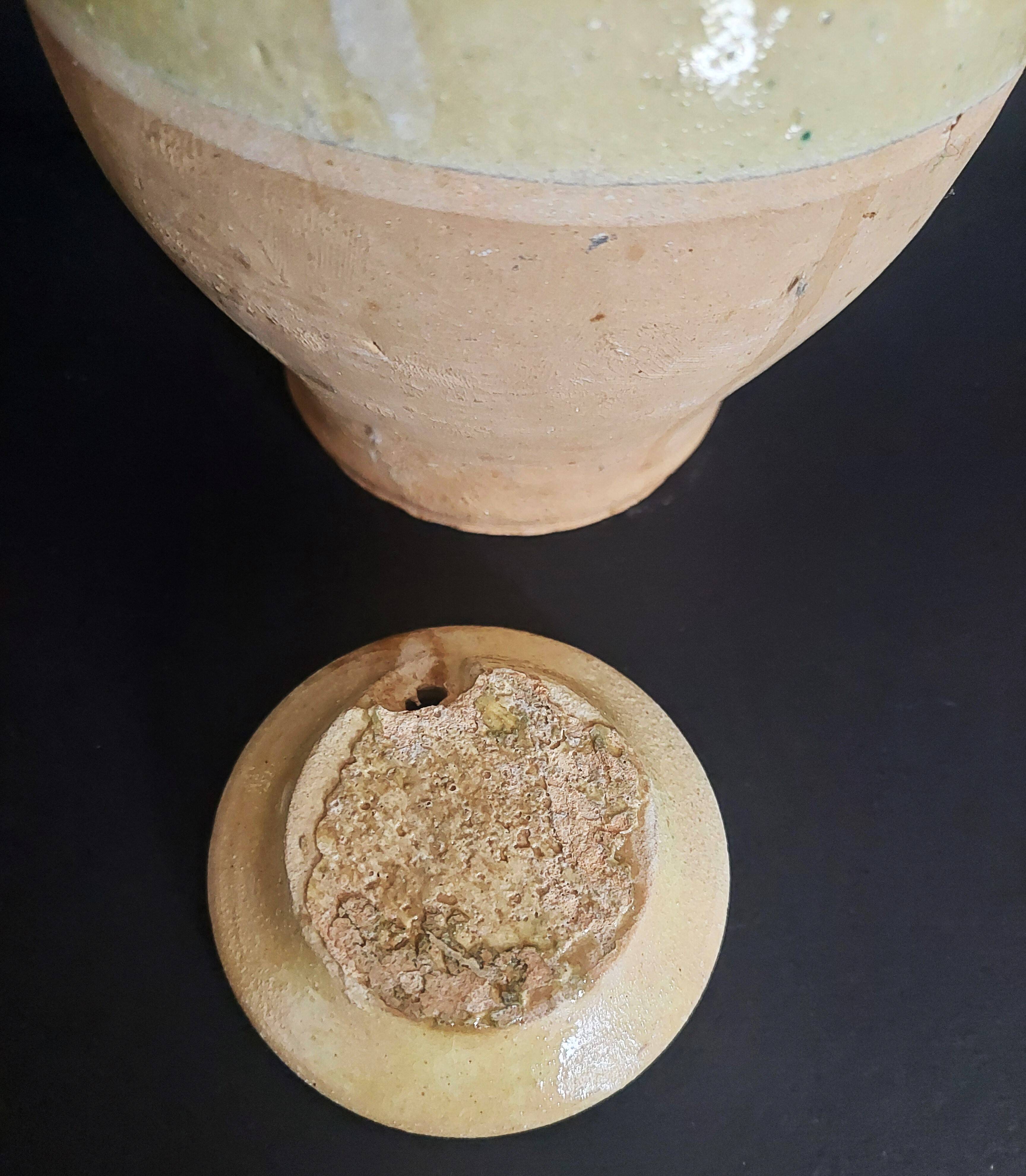 Cruche chevrette terre cuite vernissée à couverte jaune début XXème