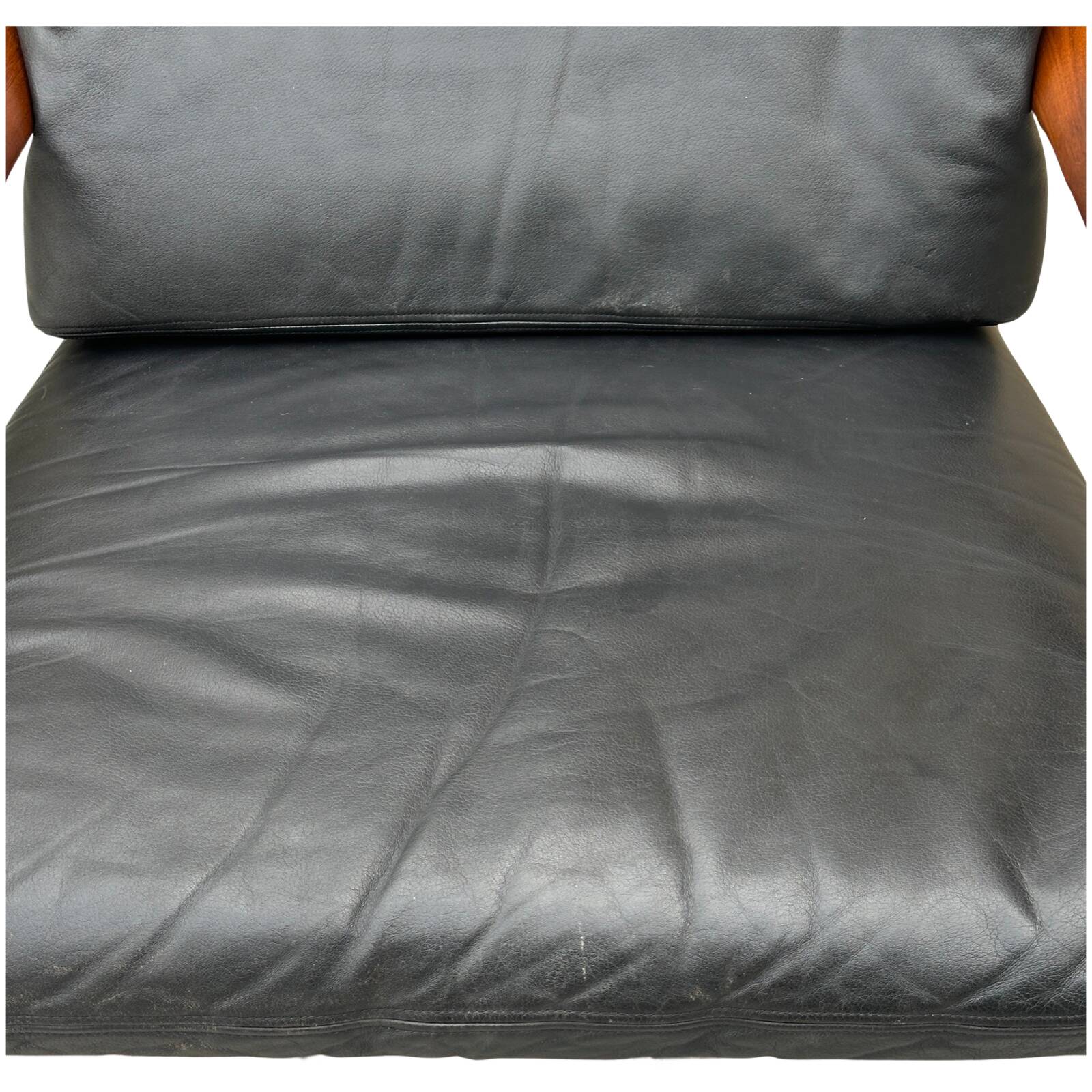 Scandinavian armchair in black leather and teak - 1960s