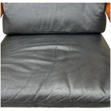 Scandinavian armchair in black leather and teak - 1960s