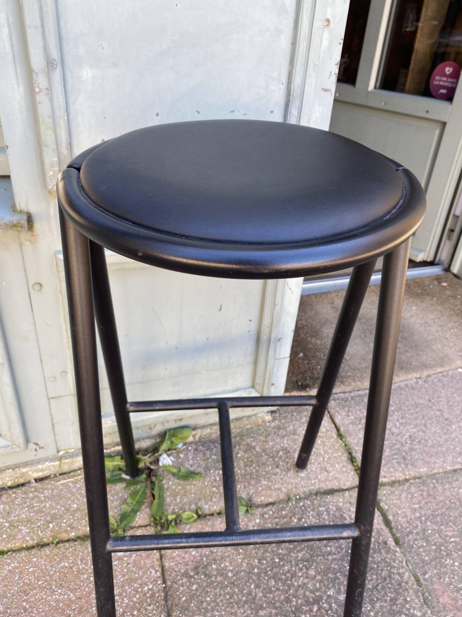 Black metal bar stool