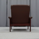 Pair of armchairs and ottoman in leather, 1970