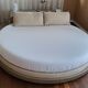 Contemporary round leather bed Roche Bobois