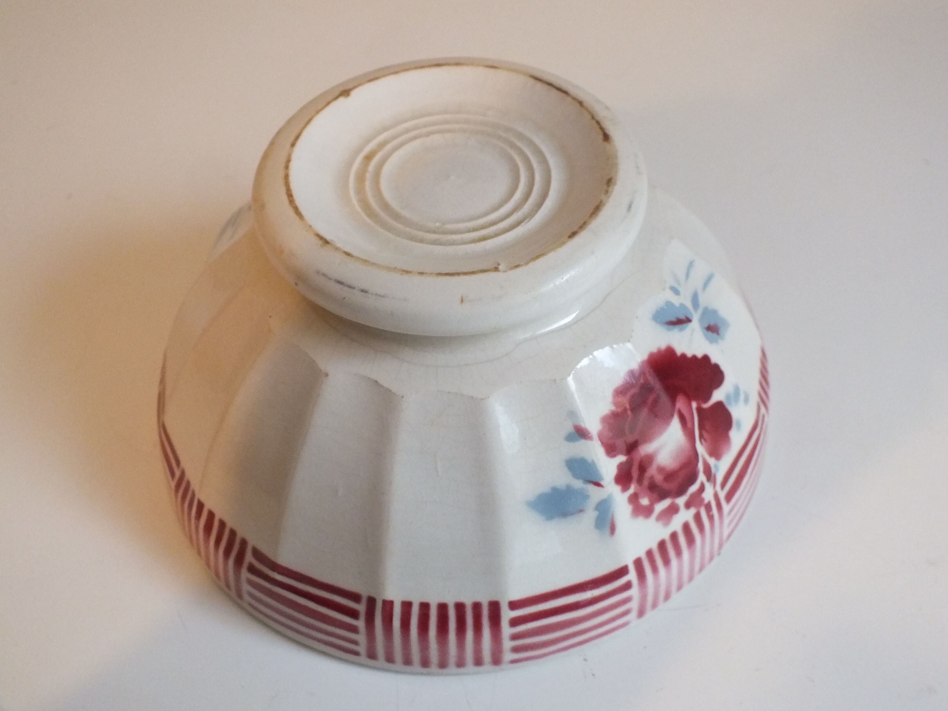 Vintage faceted bowl decorated with roses