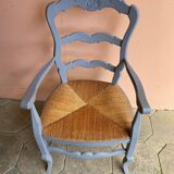 Provencal style straw armchair with gray blue patina armrests