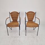 Pair of wicker and iron armchairs by Frederic Weinberg, United States, 1950s.