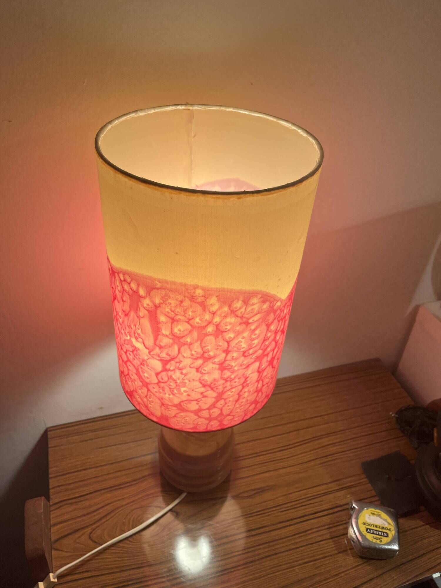 Vintage lamp with a carved wooden base from the 1970s.