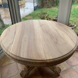 Oval solid walnut dining table on central leg with 4 extensions, 12/15 people