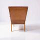 Vintage armchair in light brown faux leather, 1960s.