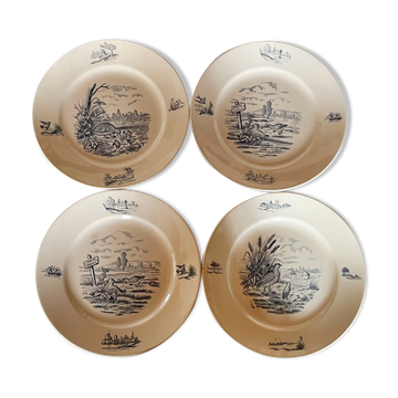 Set of 4 vintage Longchamp plates.