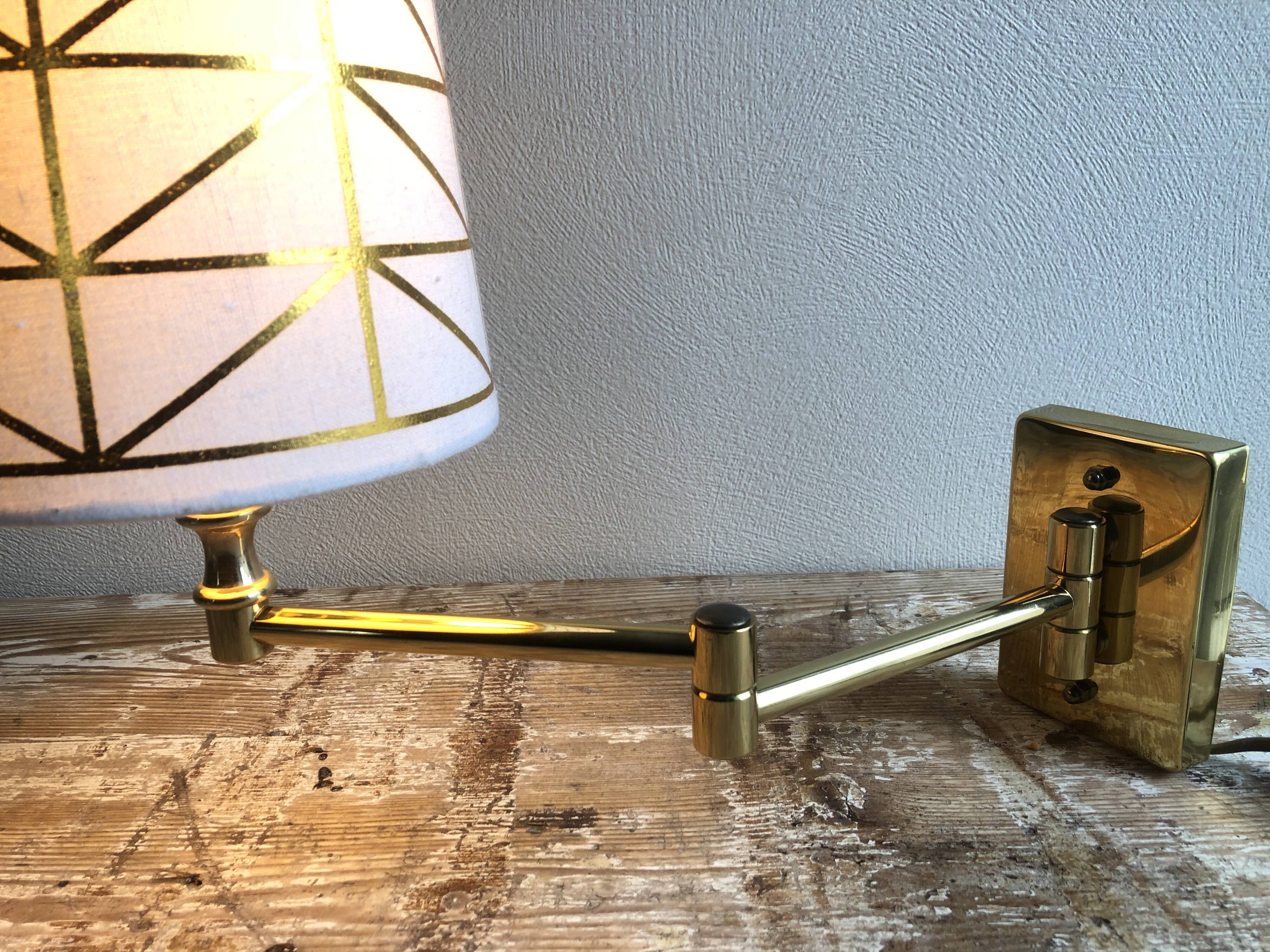 Deschuytener brass articulated wall lamp