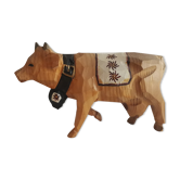 Carved and painted wooden cow