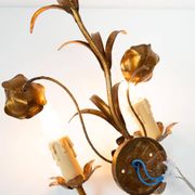 Vintage wall light in gold metal with flower and leaf decoration
