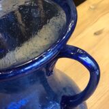 Pitcher made of blown and bubbled glass