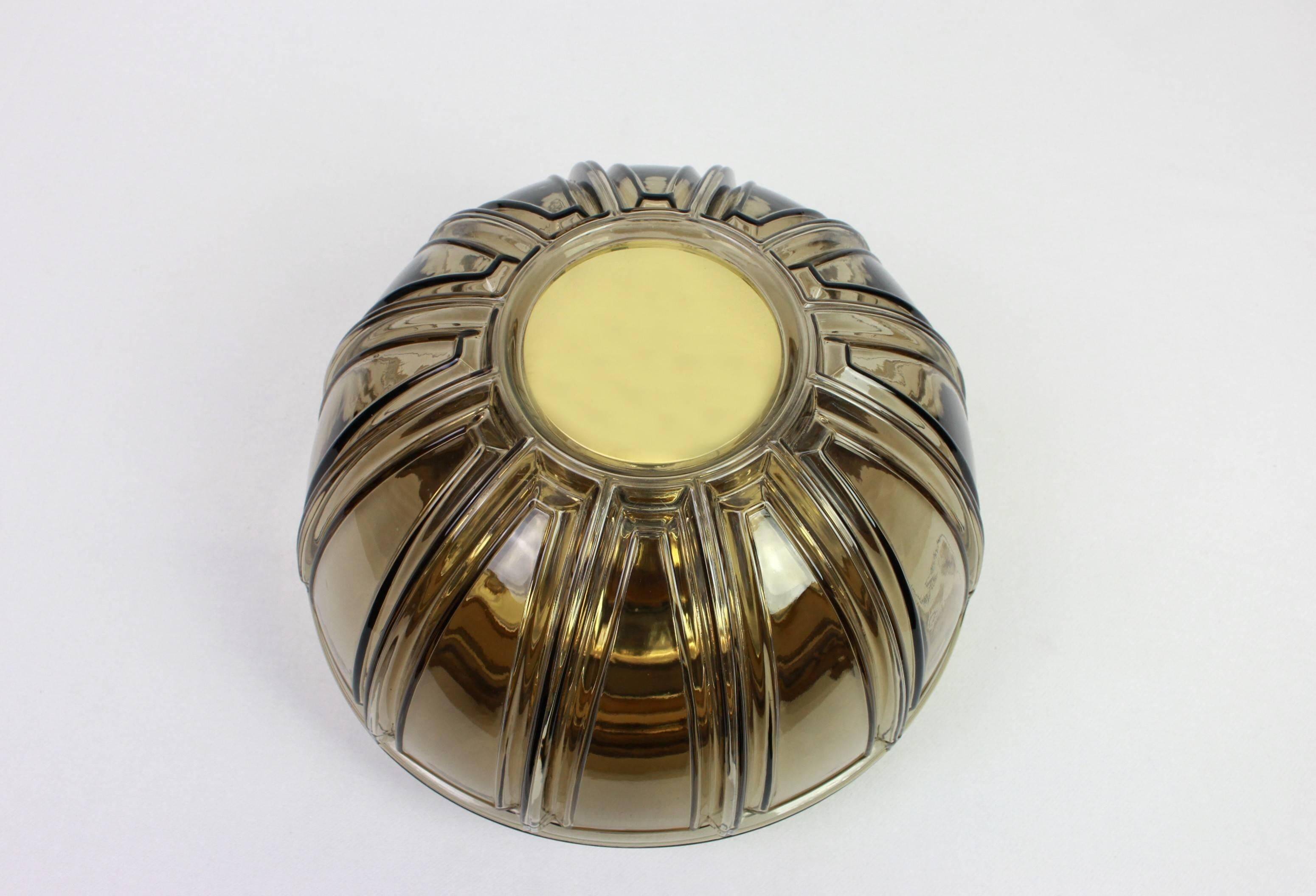 Pair of wall lights or ceiling lights in brass and amber glass by Limburg, Germany, 1960s.