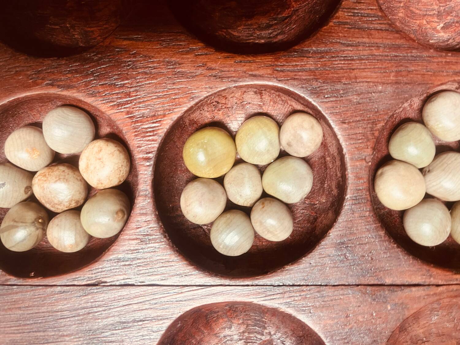 Awalé game in carved wood