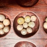 Jeu d’Awalé en bois sculpté