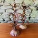 Pair of candlesticks with golden leaves from the 1960s.