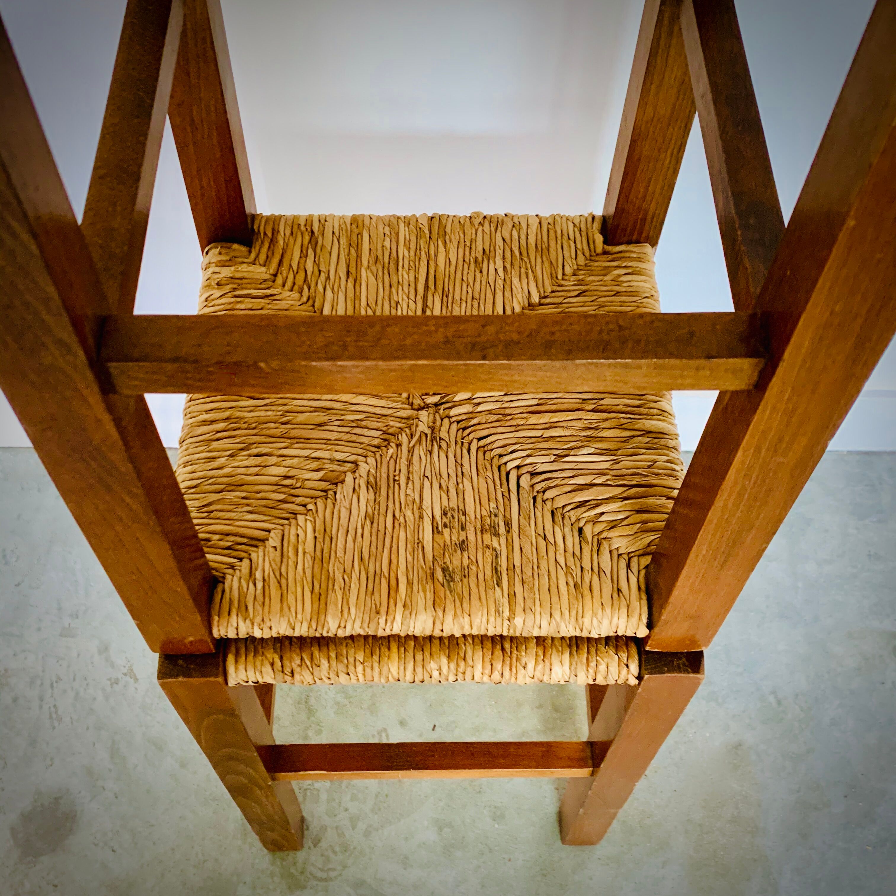 Two light wooden stools varnished and mulched seat