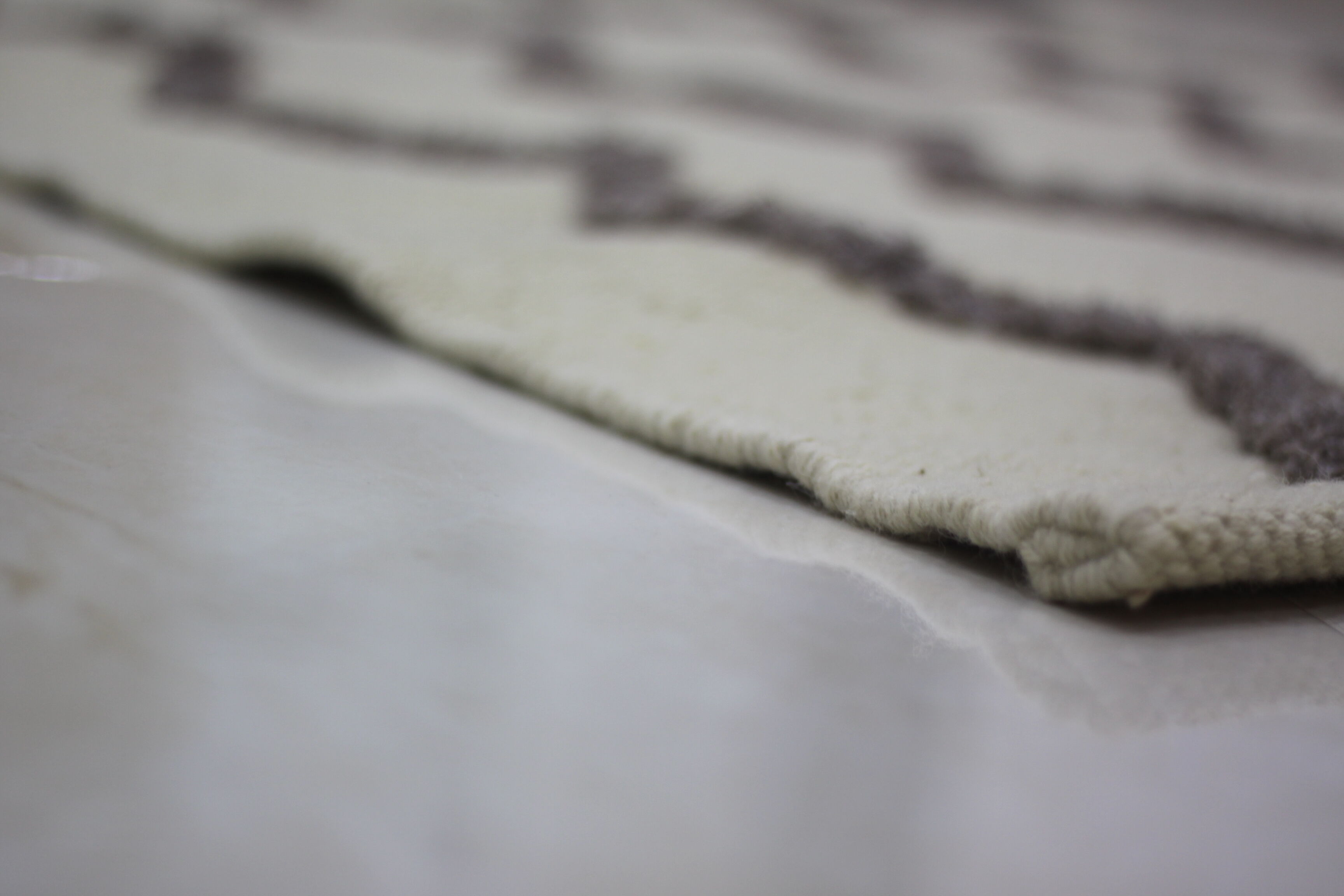 Handmade beige wool carpet 190x125cm