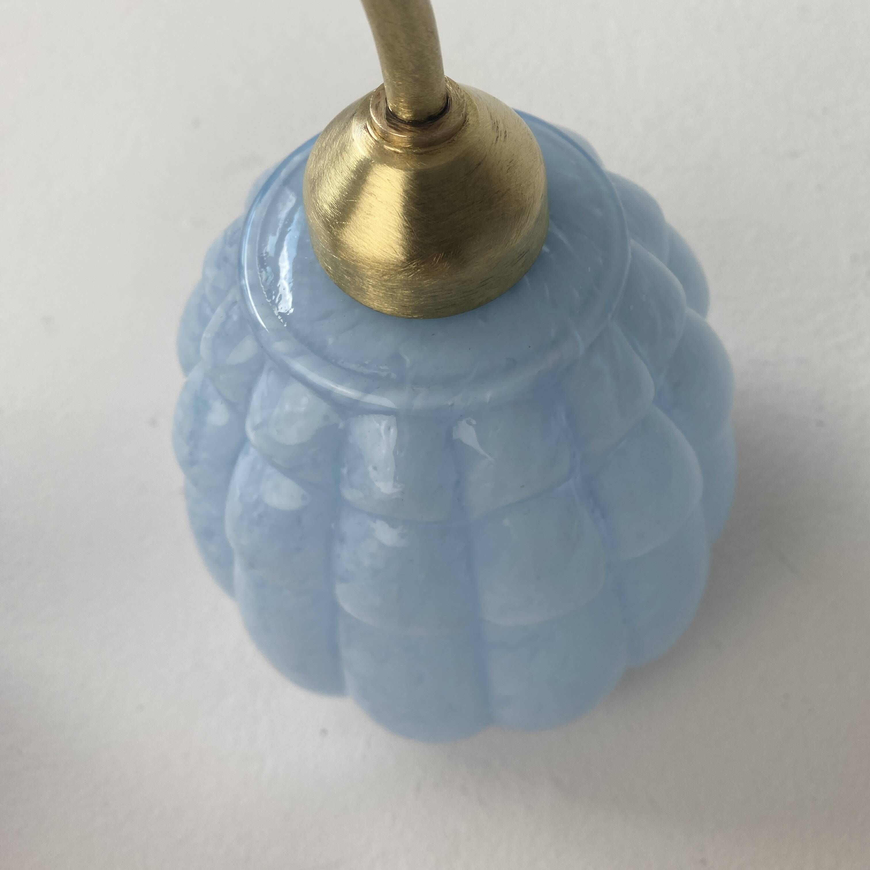 Old gooseneck wall lamp in vintage clichy glass