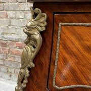 Antique French-style desk with green leather top and bronze mounts
