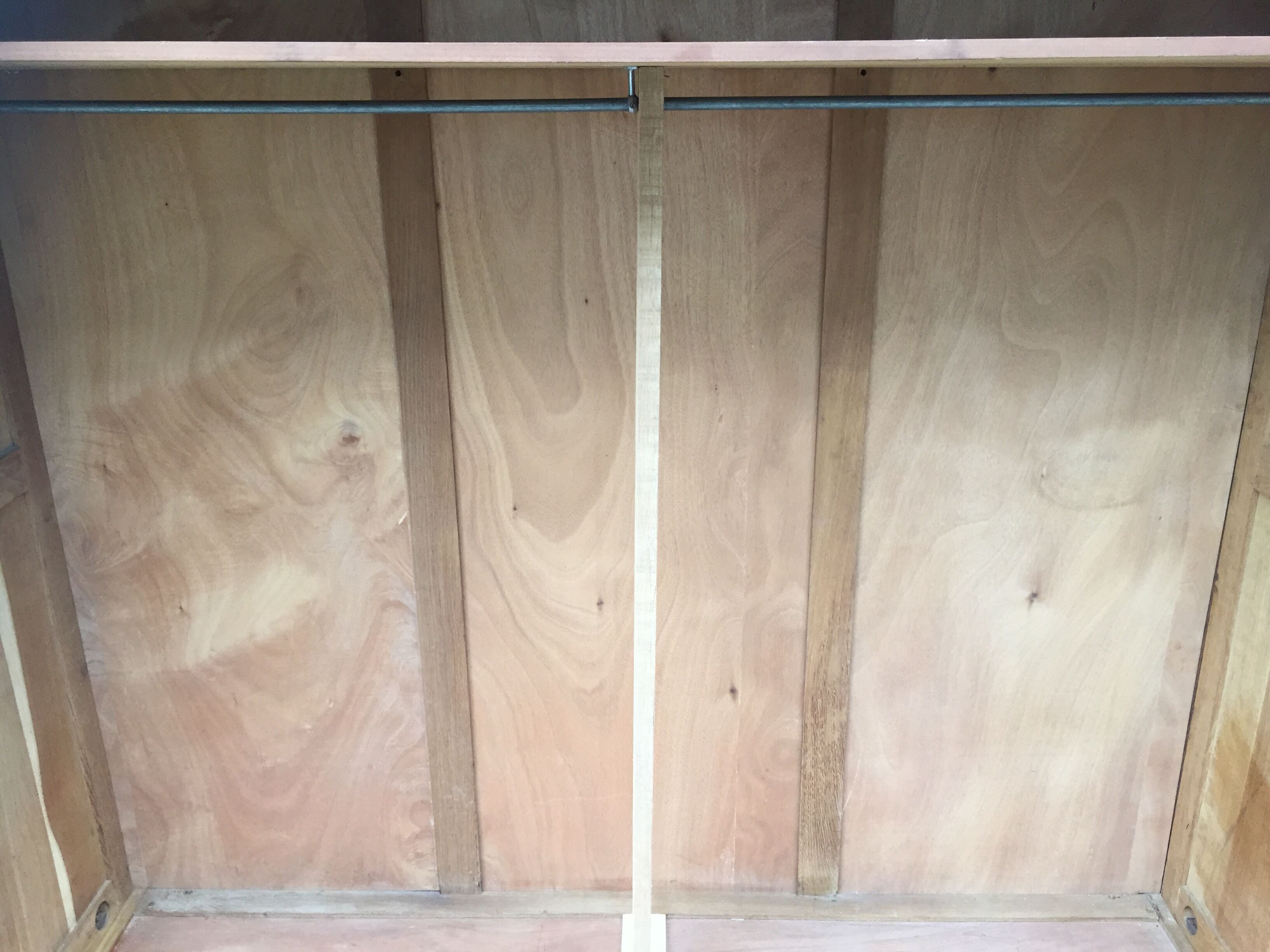 Vintage wardrobe compass feet with 3 sliding oak doors.