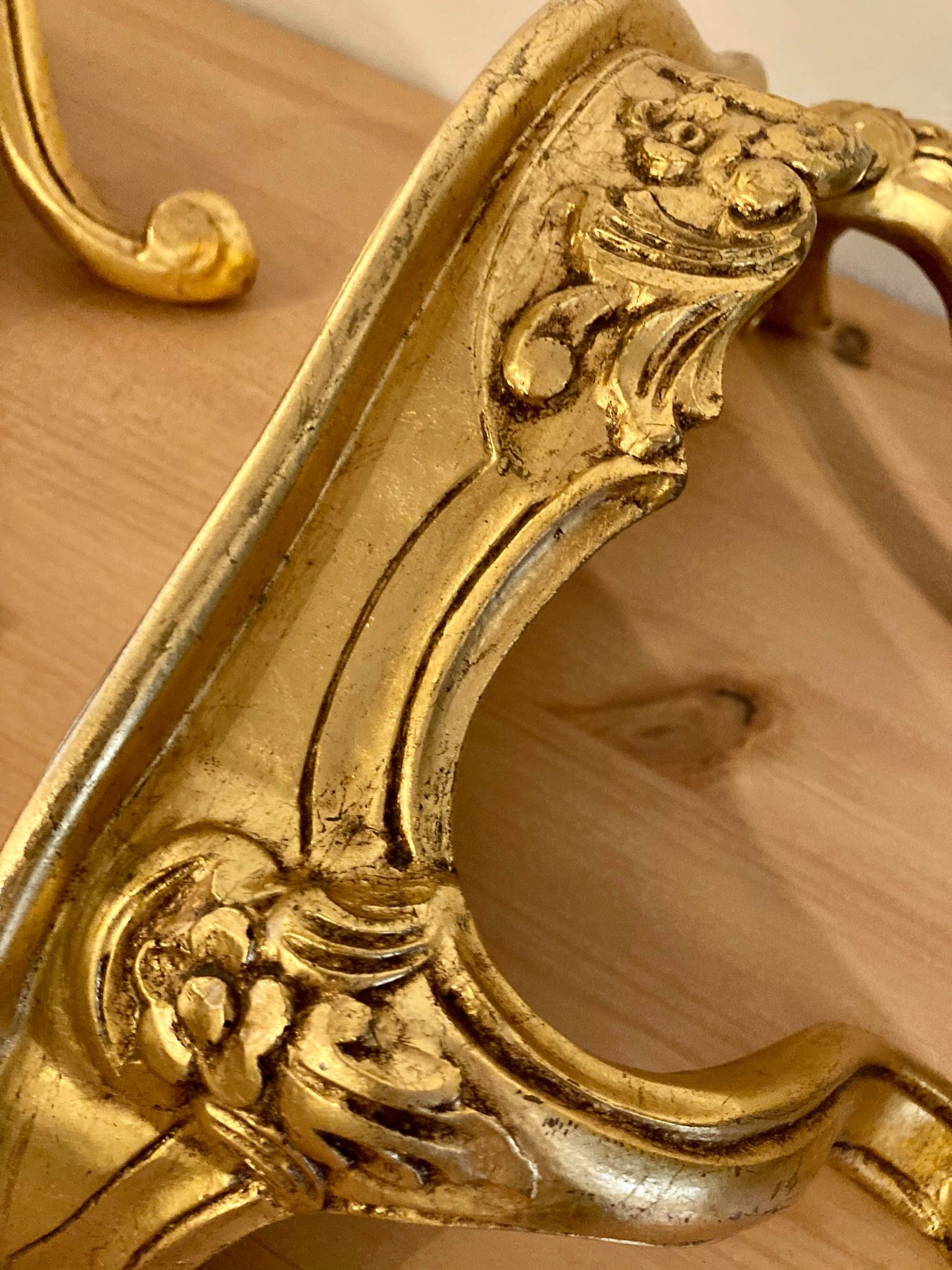 Pair of gilded wall shelves