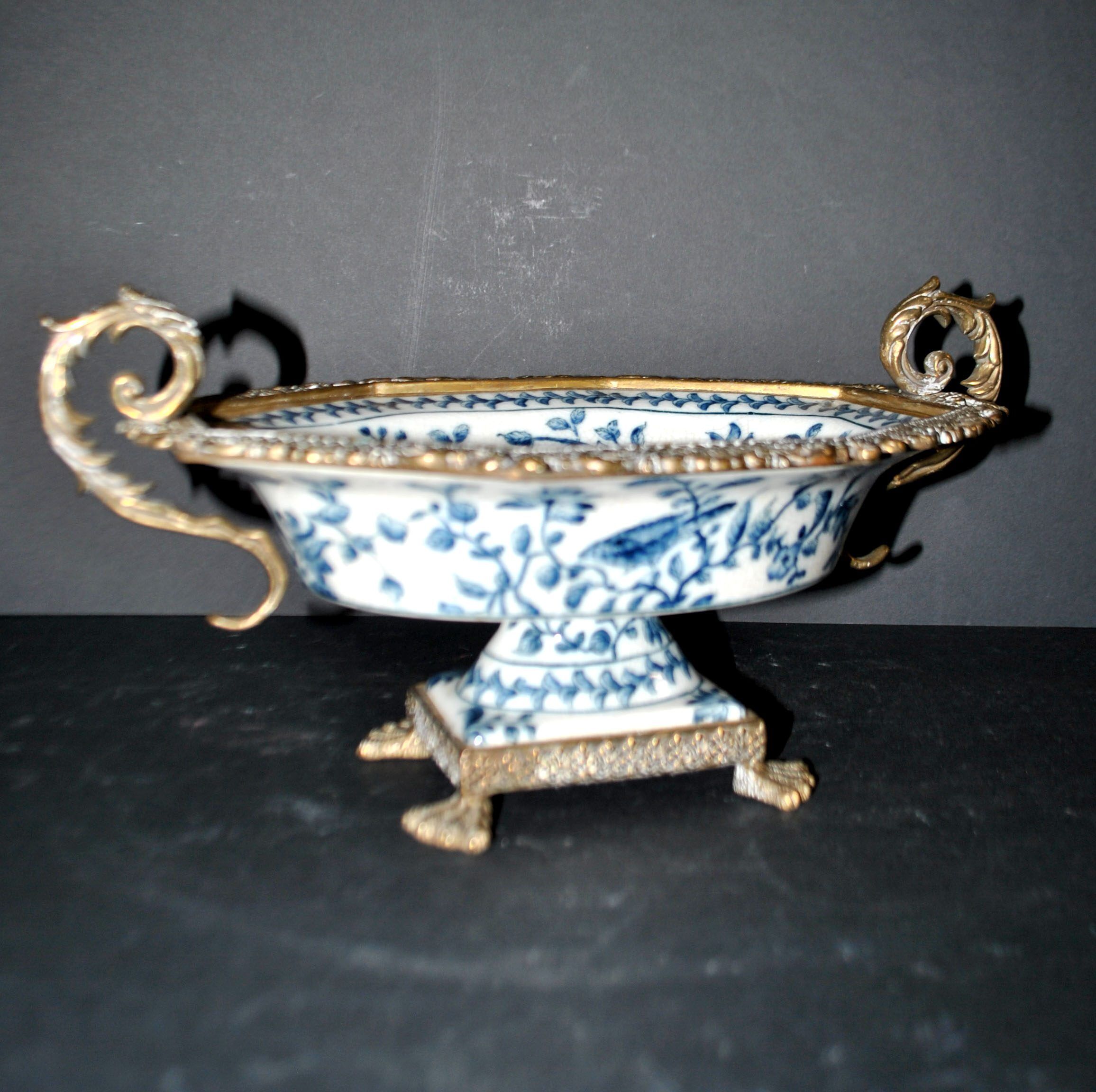 Blue Chinese floral porcelain coupe on a bronze base table centrepiece.