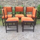 Series of 6 vintage chairs in orange fabric and black lace-up.