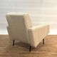 Chair by Pierre Guariche for Airborne in white.