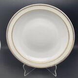 Plat rond creux en porcelaine de Limoges liseré jaune et doré