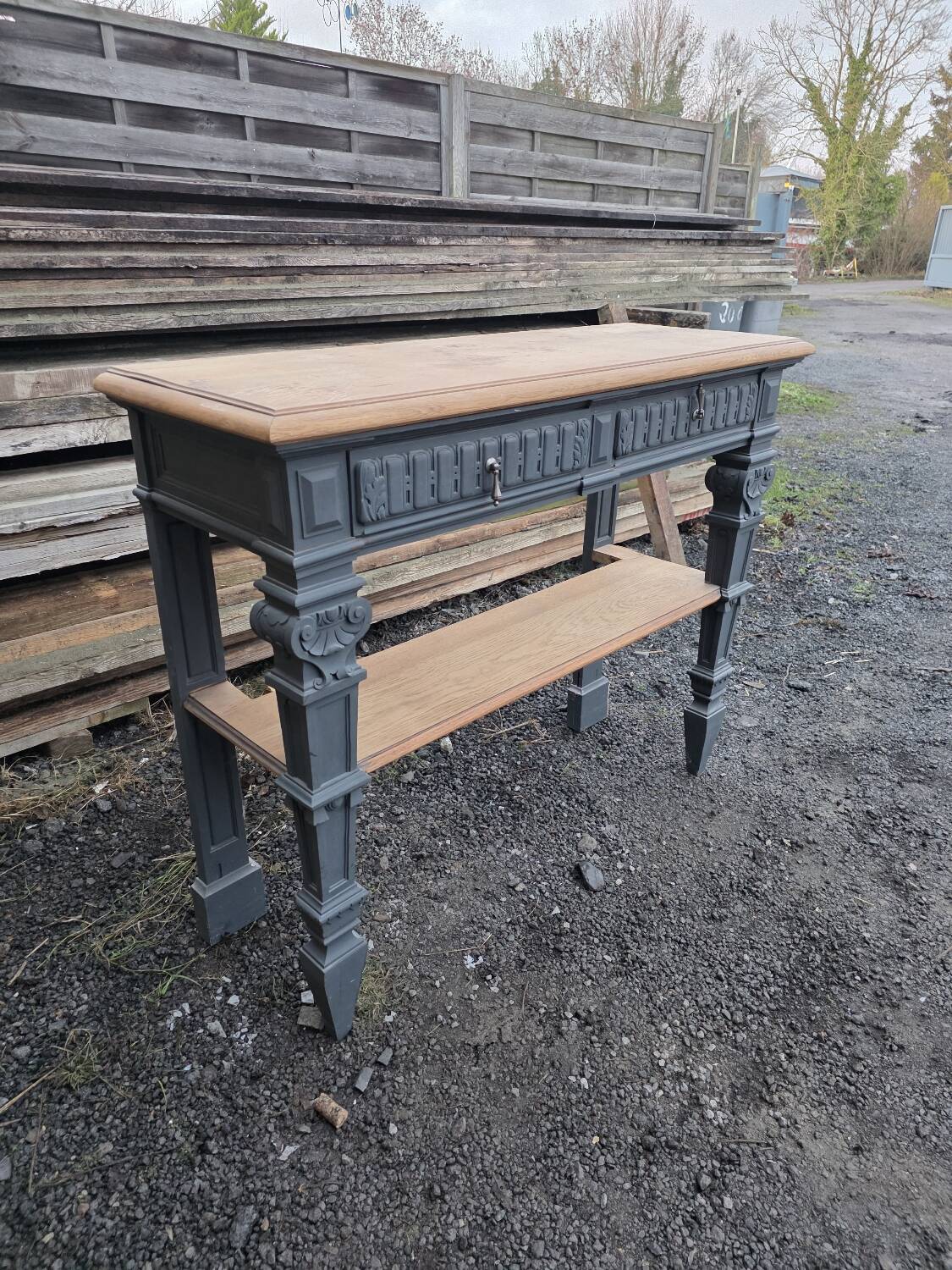 Console in patinated solid oak, late 19th century.