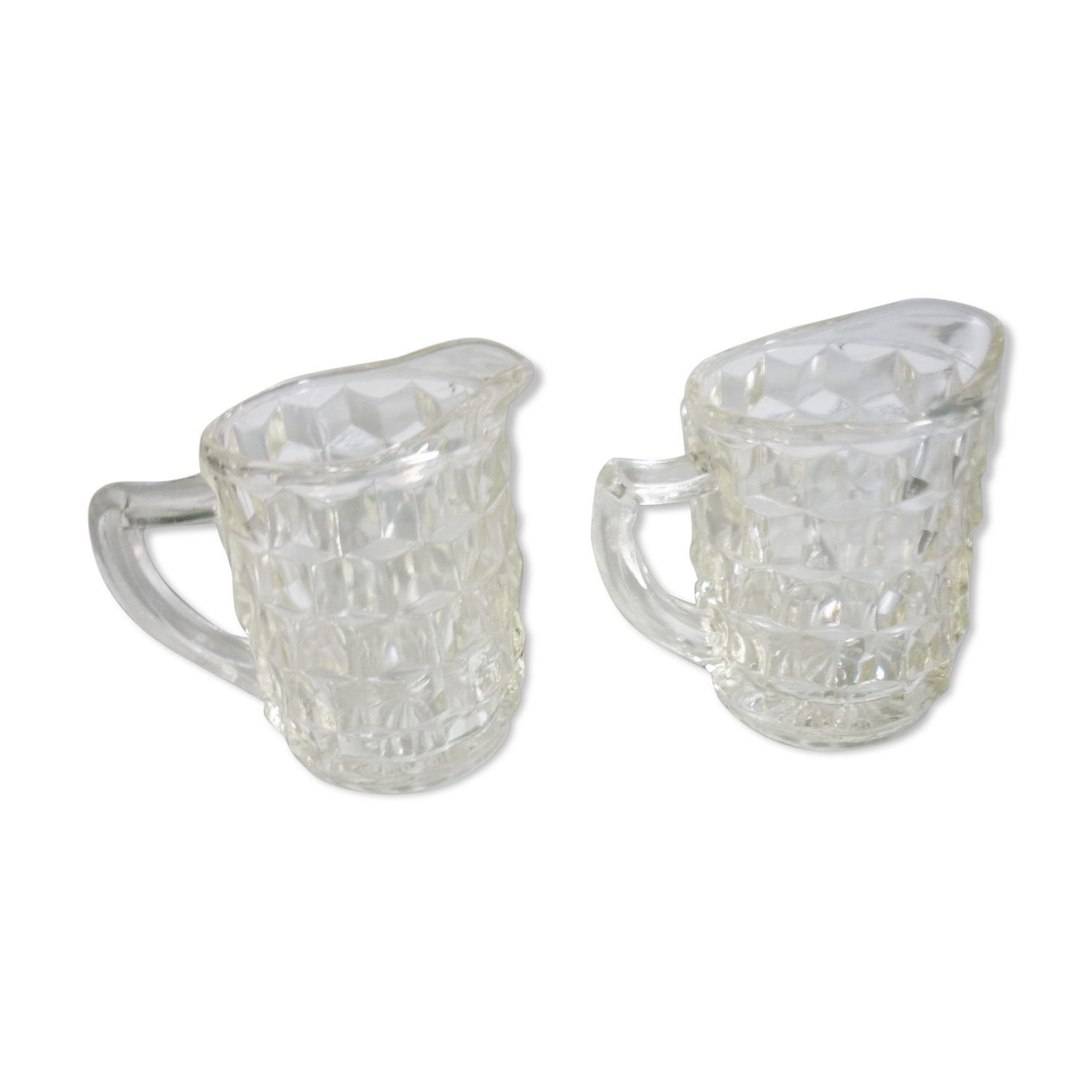 Lot of milk pots or moulded glass cream jars