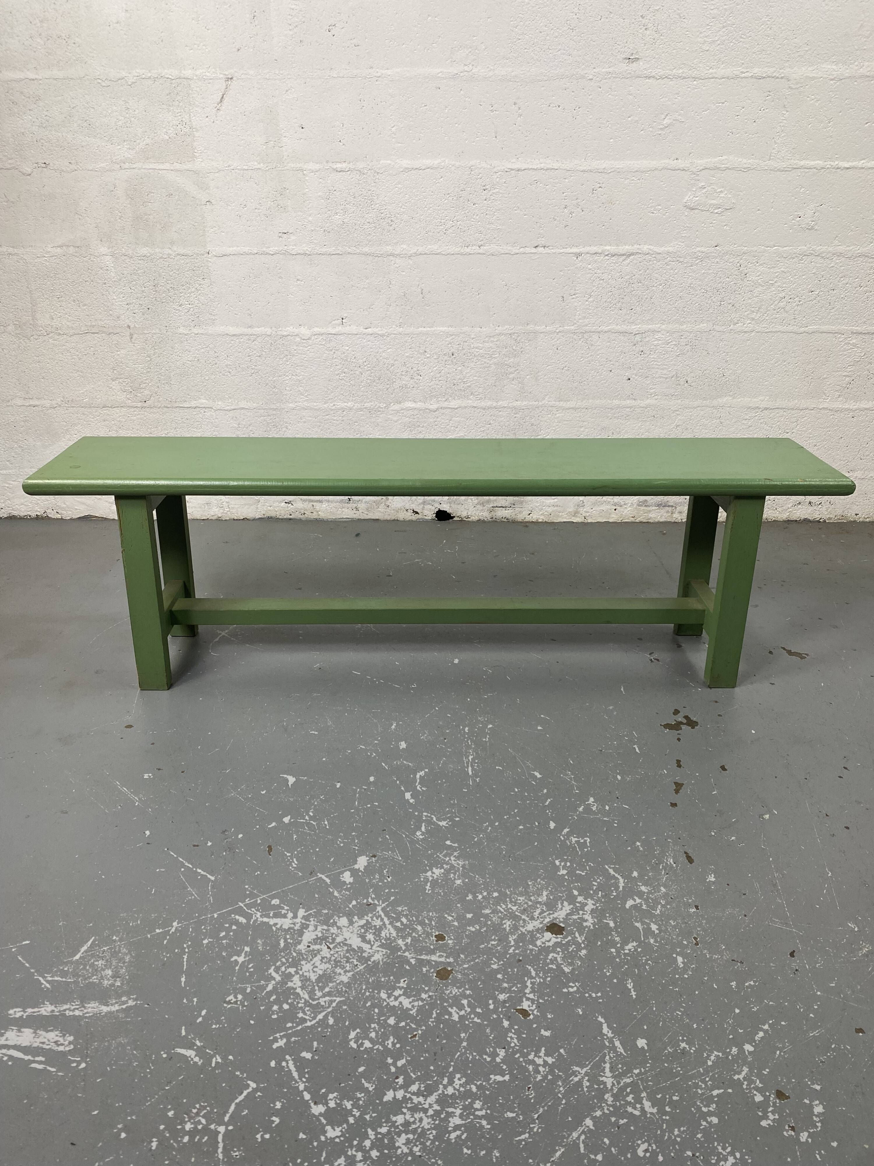 Green wooden bench